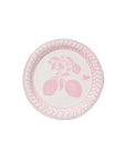 Round plate with citrus fruit design on a white background