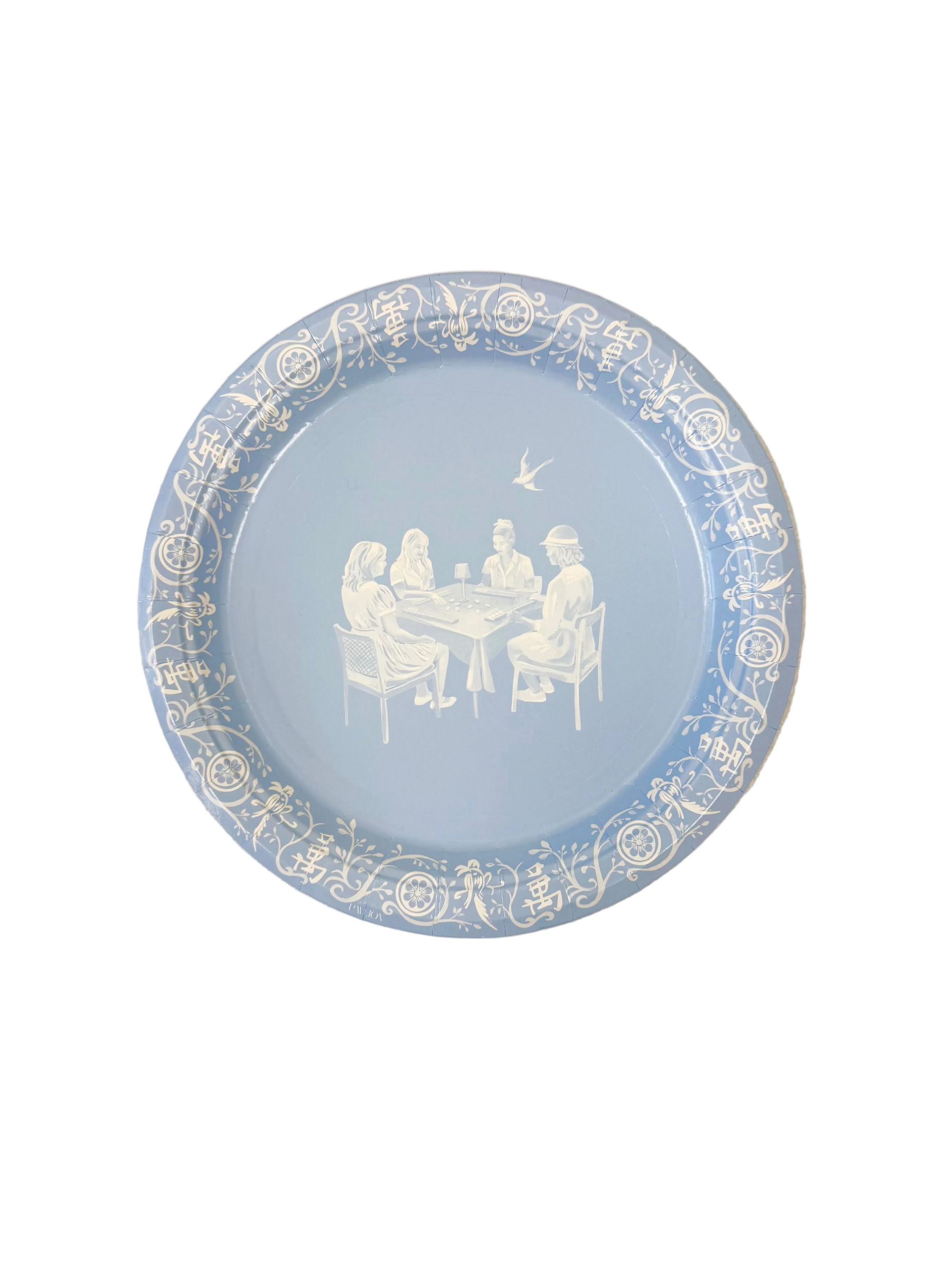 Decorative plate with a blue background and white illustrations of people around a table on a beige surface.